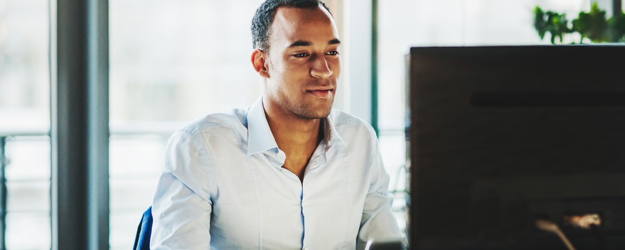 Sports Professional at computer