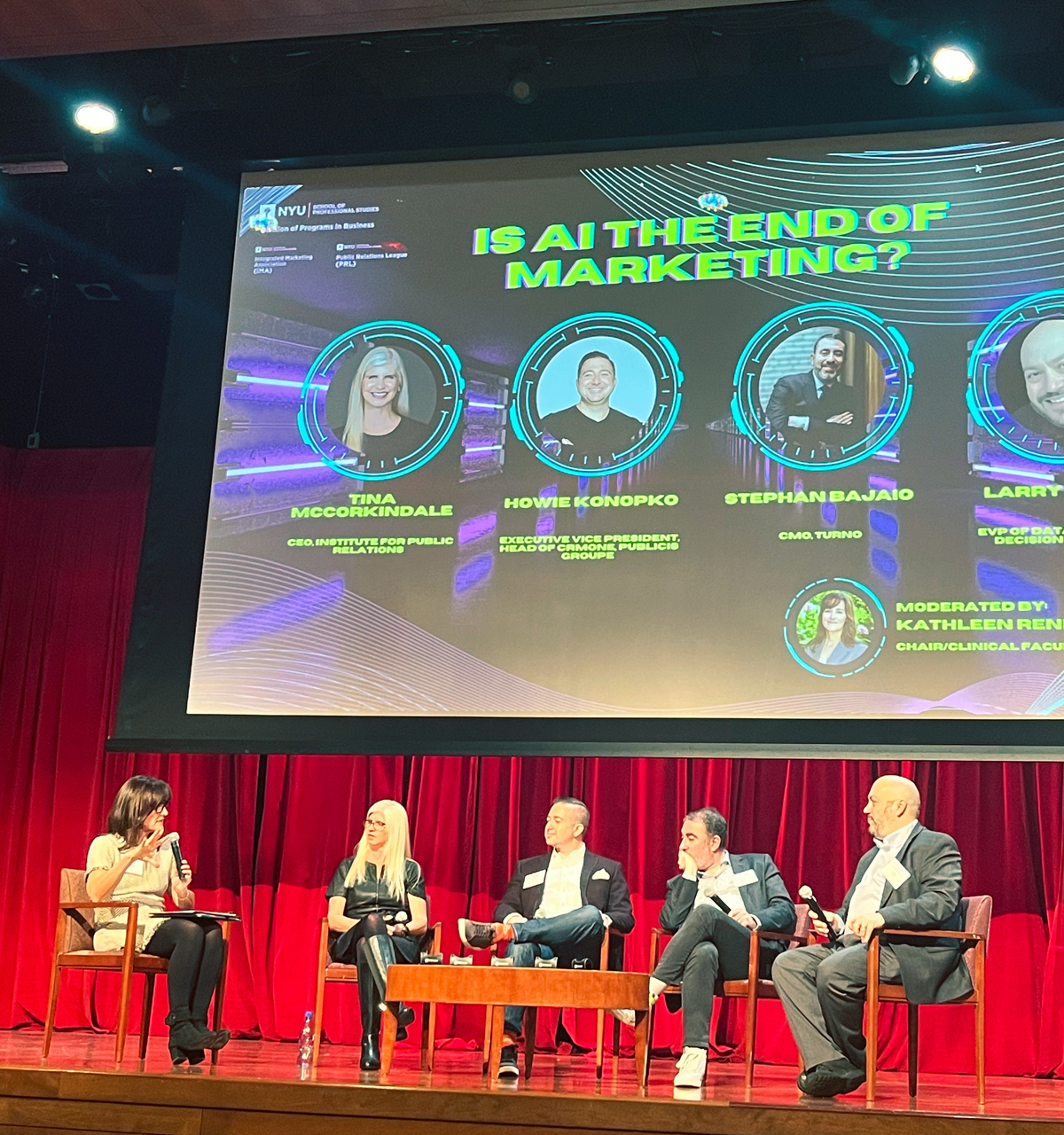 Five panelists participate in a session titled "Is AI the End of Marketing?" at the AI Summit.